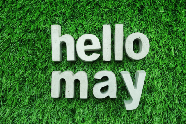 hello may in letters on grass