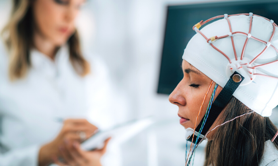 Doctor and Patient in Neuroscience Lab, Doing EEG Scan