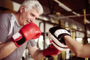 man boxing in gym