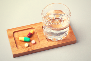 Medications and glass of water