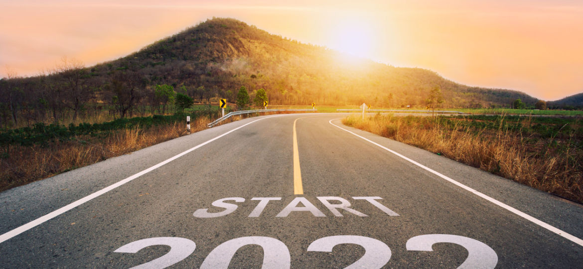 Start 2022 written on highway road in the middle of empty asphalt road
