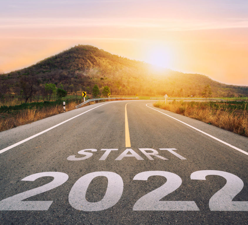 Start 2022 written on highway road in the middle of empty asphalt road