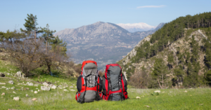 Two red camping backpacks