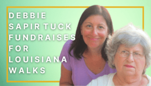 Debbie Sapir Tuck with her mother, Roro, in front of an outdoor background. They are both white women. Debbie is behind her mother in a purple shirt. Roro is wearing a white shirt and clear-frame glasses. Roro has grey hair and Debbie has brown hair.The text says Moments of Victory Debbie walks for Louisiana Walks.